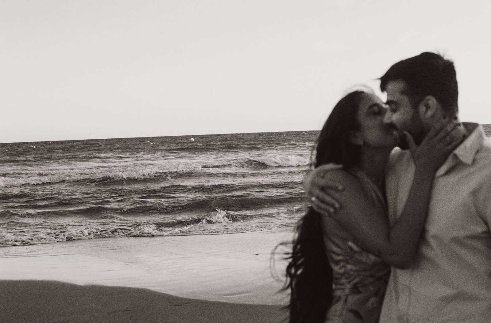 Sindhu and Amish kissing on the beach
