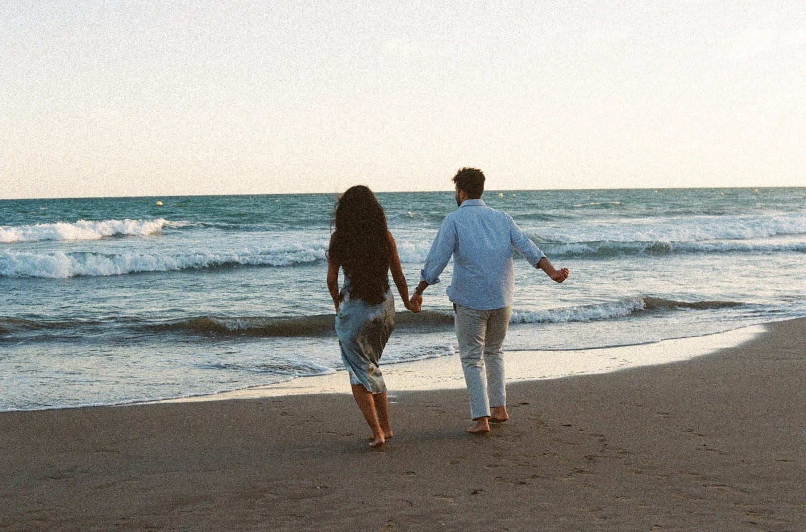 Sindhu and Amish walking into the sea